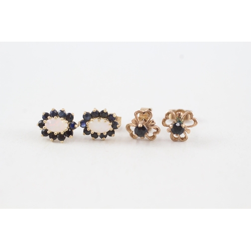 110 - 2 x 9ct gold stud earrings set with diamond & sapphire (1.5g)