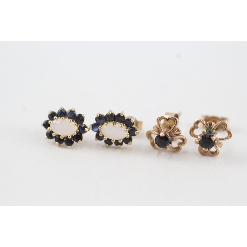 110 - 2 x 9ct gold stud earrings set with diamond & sapphire (1.5g)