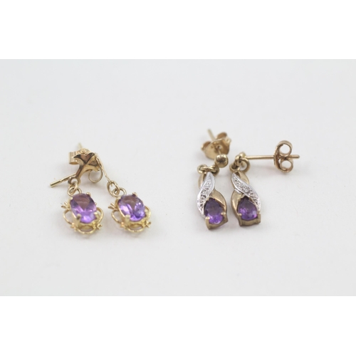 111 - 2 x 9ct gold diamond & amethyst drop earrings (2.1g)