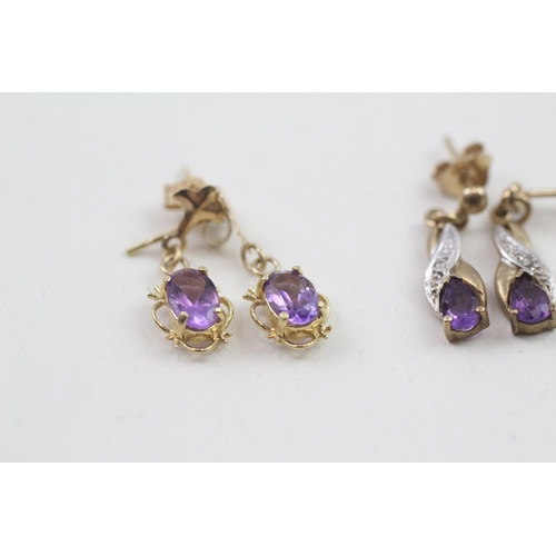 111 - 2 x 9ct gold diamond & amethyst drop earrings (2.1g)