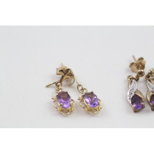 111 - 2 x 9ct gold diamond & amethyst drop earrings (2.1g)