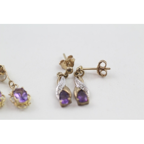 111 - 2 x 9ct gold diamond & amethyst drop earrings (2.1g)