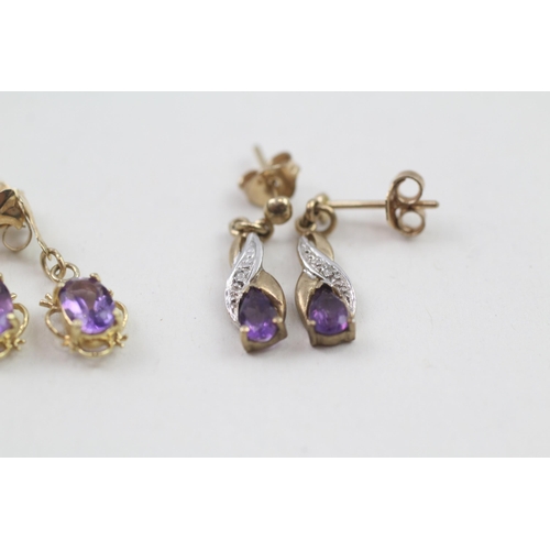 111 - 2 x 9ct gold diamond & amethyst drop earrings (2.1g)