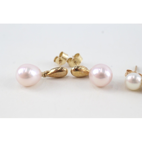 113 - 2 x 9ct gold cultured pearl earrings with diamond highlight (5.2g)