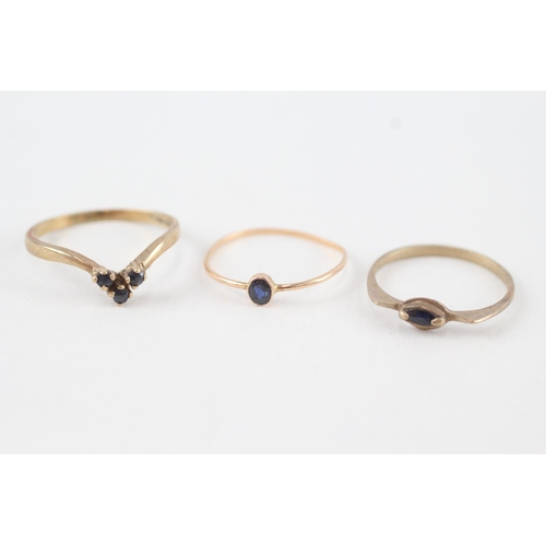 114 - 3 x 9ct gold sapphire stacking rings (2.4g) Size  N, K, K