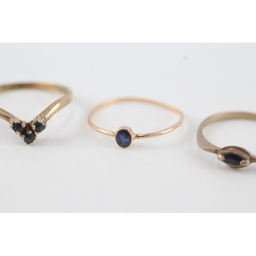 114 - 3 x 9ct gold sapphire stacking rings (2.4g) Size  N, K, K