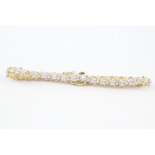 133 - 9ct gold diamond set bracelet (5.4g)