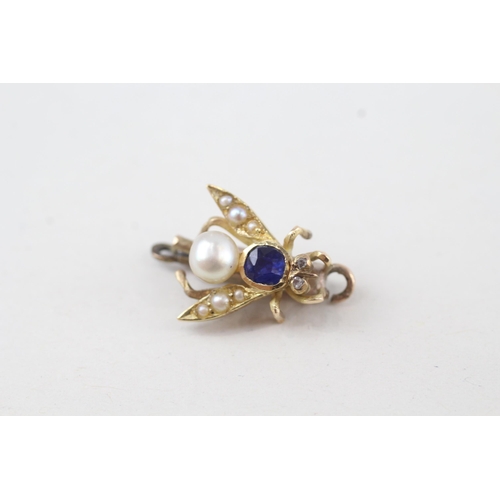 134 - 15ct gold antique diamond, sapphire and natural pearl set bug clasp (2.2g)