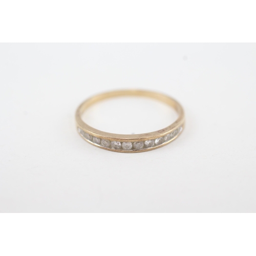 137 - 9ct gold channel set diamond ring (1.4g) Size P 1/2