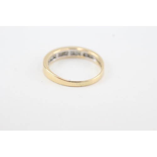 140 - 18ct gold channel set diamond ring (2.3g) Size M