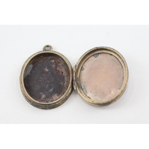 166 - 9ct gold antique back and front locket (4.6g)