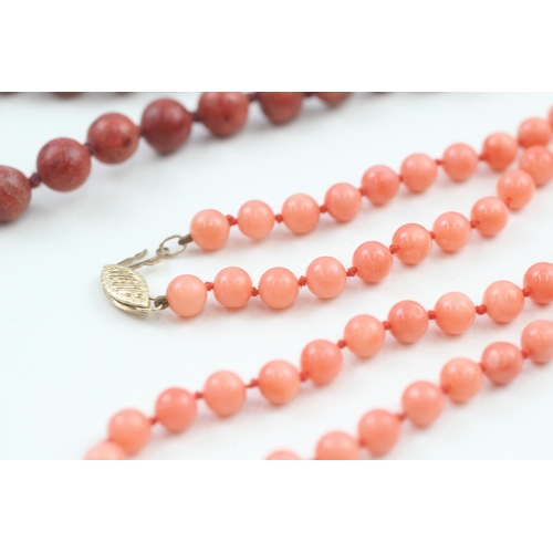 189 - 2 x 9ct gold clasp coral & sponge coral necklaces (40.3g)