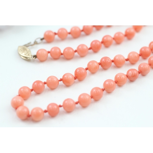 189 - 2 x 9ct gold clasp coral & sponge coral necklaces (40.3g)