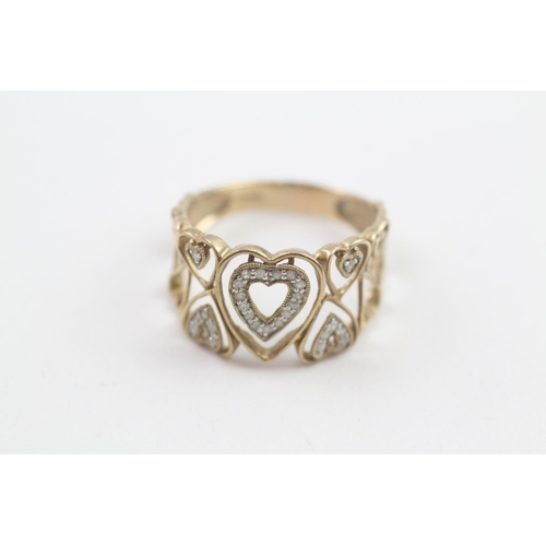 19 - 9ct gold diamond heart shaped dress ring (2.6g) Size  S