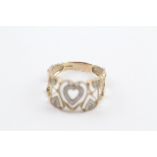 19 - 9ct gold diamond heart shaped dress ring (2.6g) Size  S