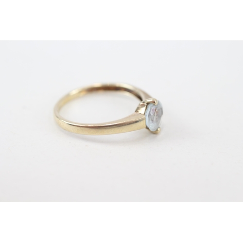 193 - 9ct gold aquamarine solitaire ring, claw set (1.5g) Size  M