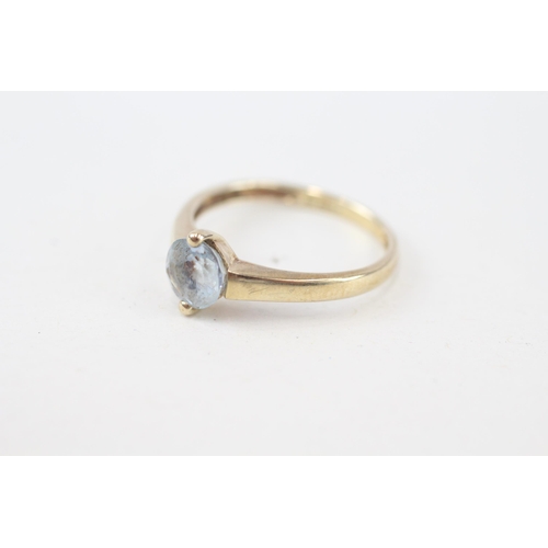 193 - 9ct gold aquamarine solitaire ring, claw set (1.5g) Size  M