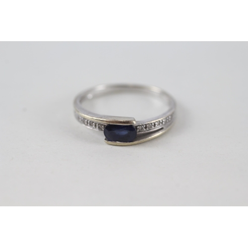 203 - 9ct gold oval cut sapphire & diamond ring (1.8g) Size  O