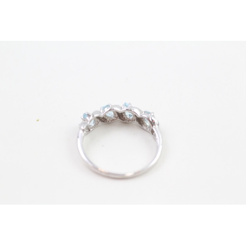 205 - 9ct white gold pear cut blue topaz & diamond half eternity ring (2.4g) Size  Q