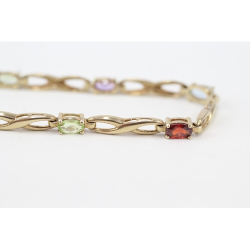 211 - 9ct gold multi-gemstone bracelet, gemstones including peridot, garnet & CZ (5.4g)