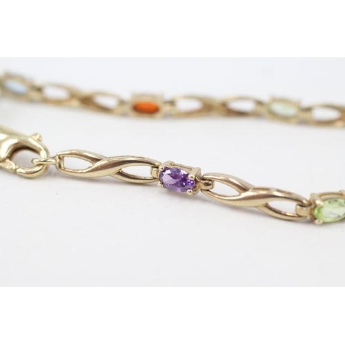 211 - 9ct gold multi-gemstone bracelet, gemstones including peridot, garnet & CZ (5.4g)