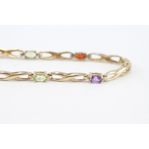 211 - 9ct gold multi-gemstone bracelet, gemstones including peridot, garnet & CZ (5.4g)