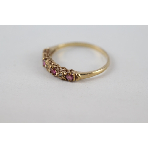 226 - 9ct gold diamond & ruby seven stone ring (1.4g) Size  Q