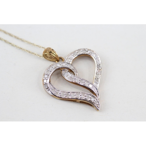 231 - 9ct gold diamond heart pendant necklace (2.2g)