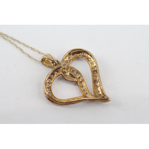 231 - 9ct gold diamond heart pendant necklace (2.2g)