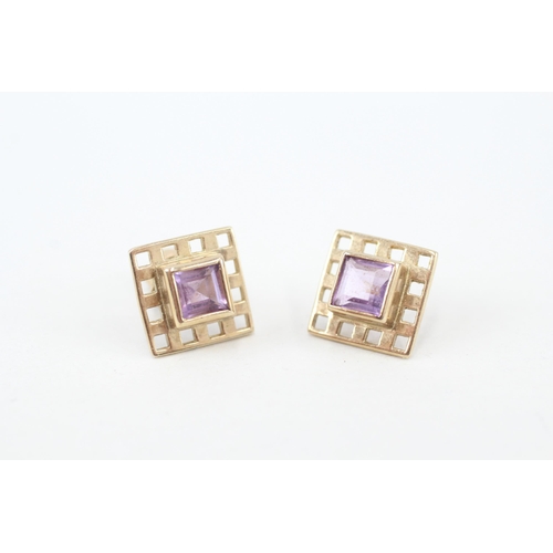 233 - 9ct gold amethyst square pattered stud earrings with scroll backs (2.7g)