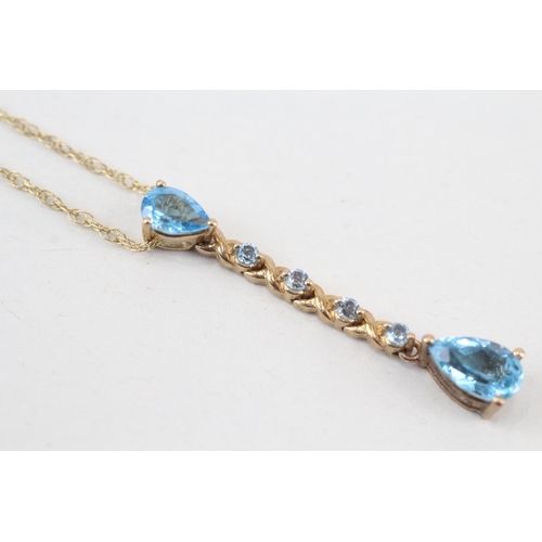 237 - 9ct gold topaz pendant necklace (2.3g)