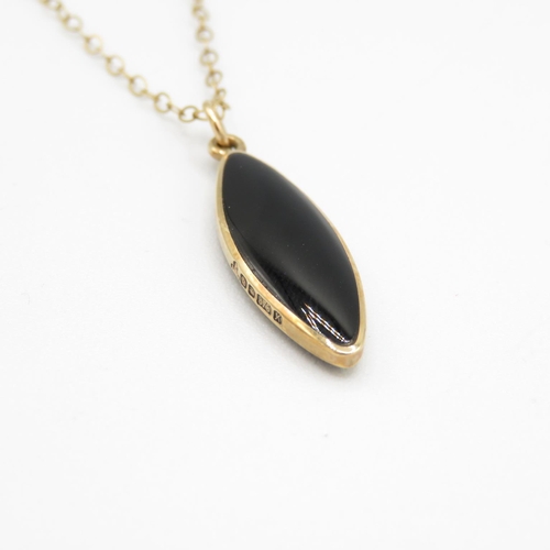 243 - 9ct gold onyx pendant necklace (2.2g)