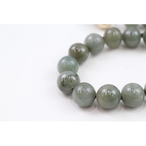 26 - 14ct gold polished jade necklace (88.5g)