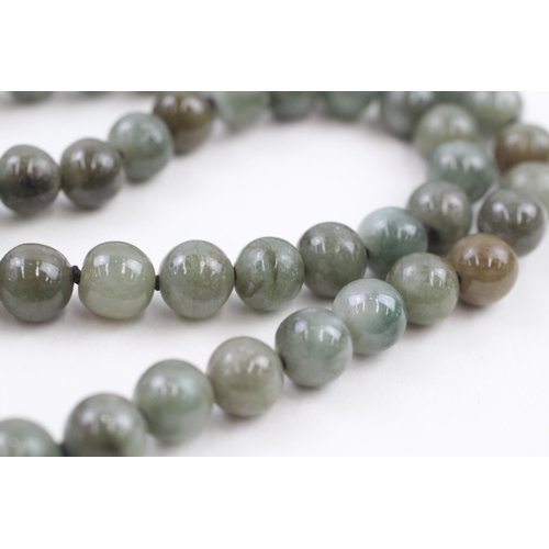 26 - 14ct gold polished jade necklace (88.5g)