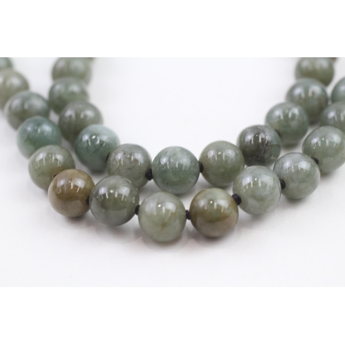 26 - 14ct gold polished jade necklace (88.5g)