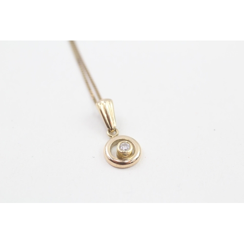 264 - 9ct gold diamond single stone round pendant necklace (1.4g)