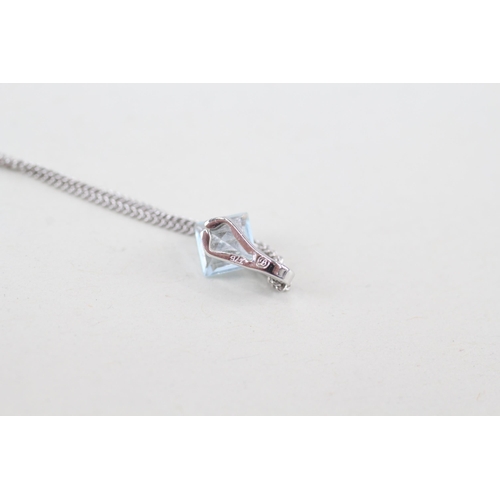 268 - 9ct white gold topaz single stone pendant necklace (1.8g)