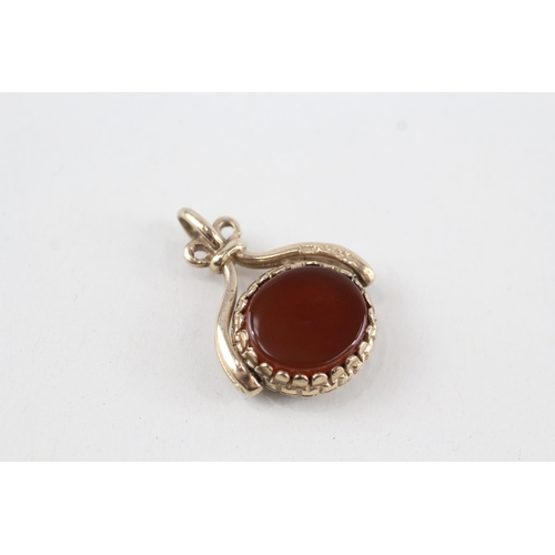 27 - 9ct gold vintage carnelian & black onyx articulated fob (5.2g)