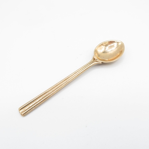 289 - A 9ct gold spoon by arts and crafts designer Omar Ramsden (18.9g)