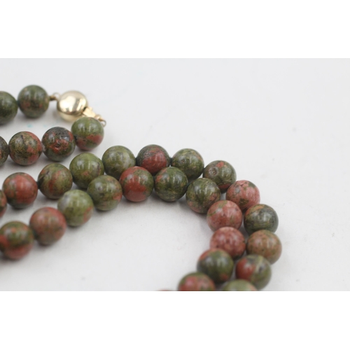 290 - 14ct gold clasped unakite bead necklace (73.5g)