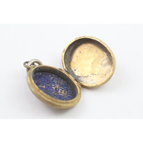 305 - 9ct gold antique back and front locket (5.8g)