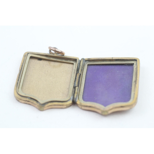 306 - 9ct gold antique back and front locket (10g)