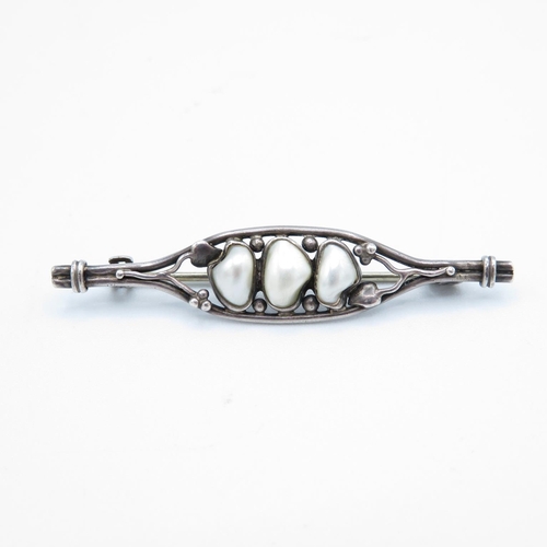 319 - Silver and blister pearl brooch