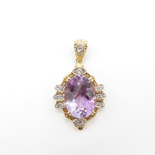 323 - HM 9ct gold pendant set with large purple amethyst with diamond surround  (9g)