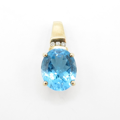 325 - HM 9ct gold pendant with blue paste stone (3.1g)