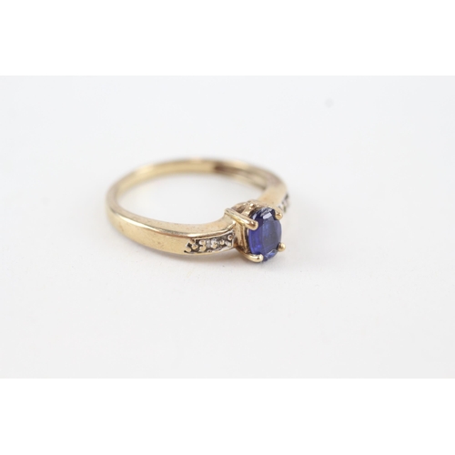 48 - 9ct gold oval cut sapphire & diamond ring (2.3g) Size  M