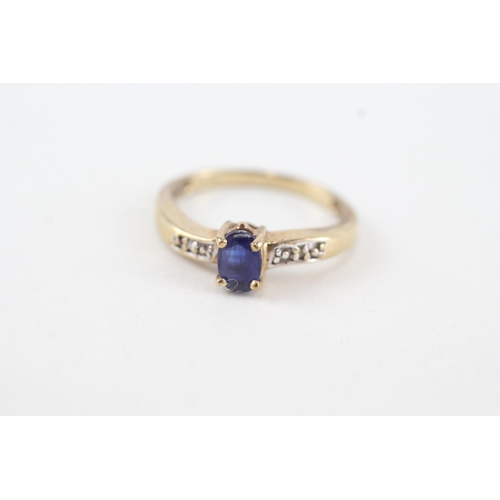 48 - 9ct gold oval cut sapphire & diamond ring (2.3g) Size  M