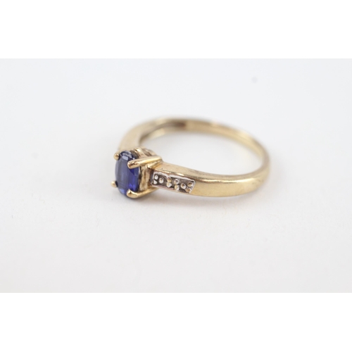 48 - 9ct gold oval cut sapphire & diamond ring (2.3g) Size  M