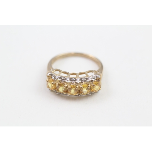 51 - 9ct gold yellow gemstone & diamond half eternity ring (2.3g) Size  J