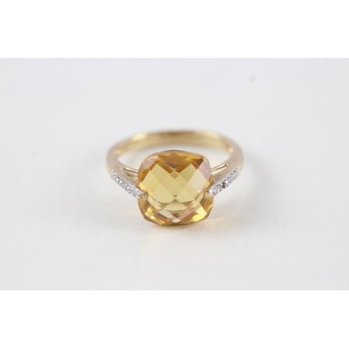 57 - 9ct gold faceted citrine & diamond dress ring (2.5g) Size  L